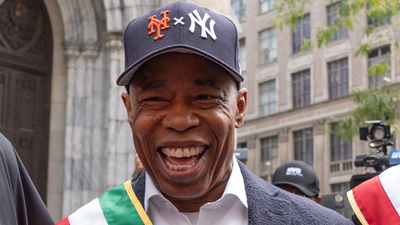 Indicted NYC Mayor Eric Adams Gets Hit Hard For Mets-Yankees Hat Amid Playoffs